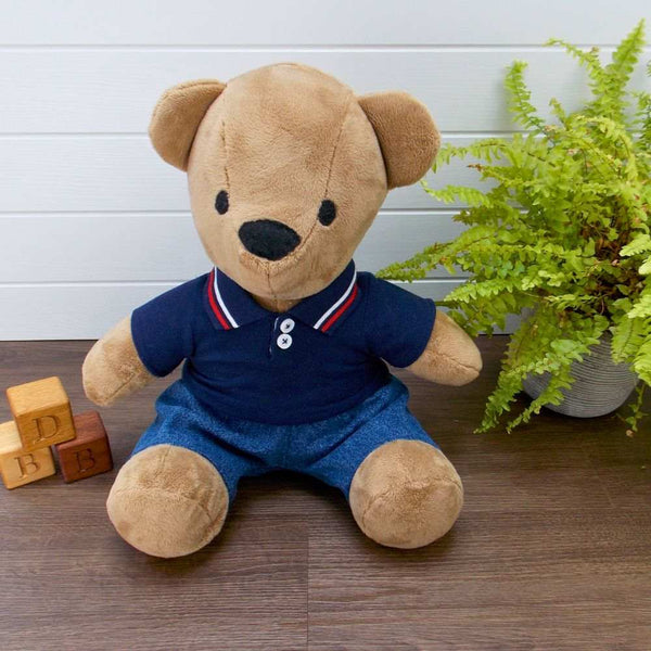 Funky Friends Factory Melody Bear wearing blue denim jeans and a blue polo t-shirt with a red & white strip on the collar